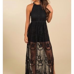 Black romper with long lace over lay